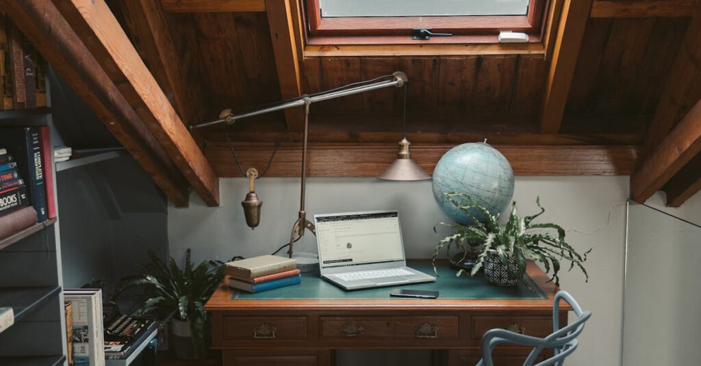 A cozy attic office space with a vintage desk, globe, and books under a skylight.